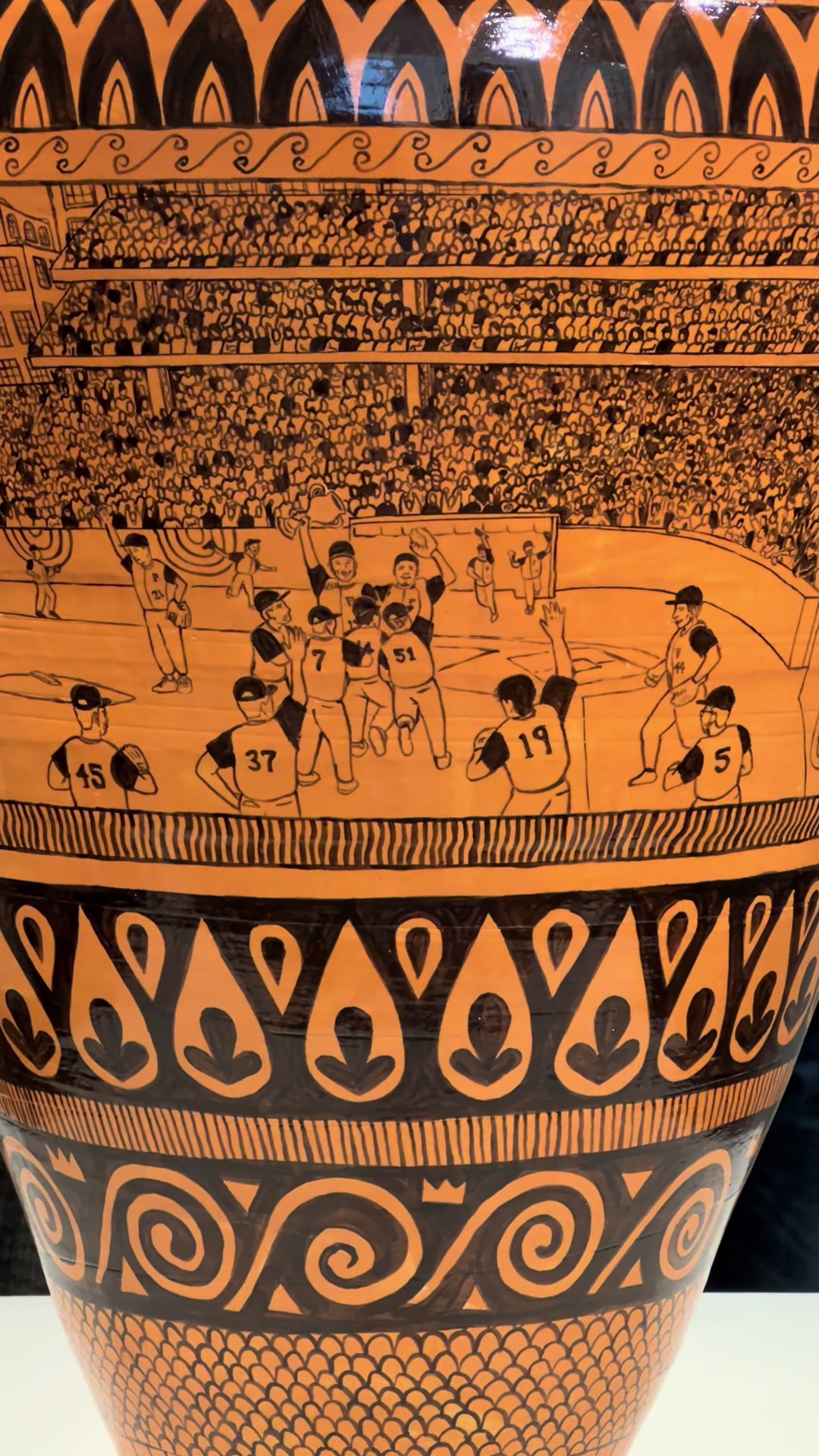 “Roberto Lugo / Orange and Black” features vases that draw on Ancient Greek pottery to tell personal and communal stories of contemporary social and political oppression. This exhibition is on view until July 6, 2025 at Art@Bainbridge, Princeton University Art Museum. Roberto Lugo is featured in the EAST episode of Craft in America, premiering on PBS December 19, 2025 (check local listings). Showcasing the vast community of craft artists in the US, Craft in America is producing 4 special episodes for @Handwork : EAST, WEST, NORTH, SOUTH. #potter #philadelphiaartist #puertorican #potteryvideos #potteryvideos #robertolugo #thingstodoinprincetonnj #potteryexhibition #pottery 